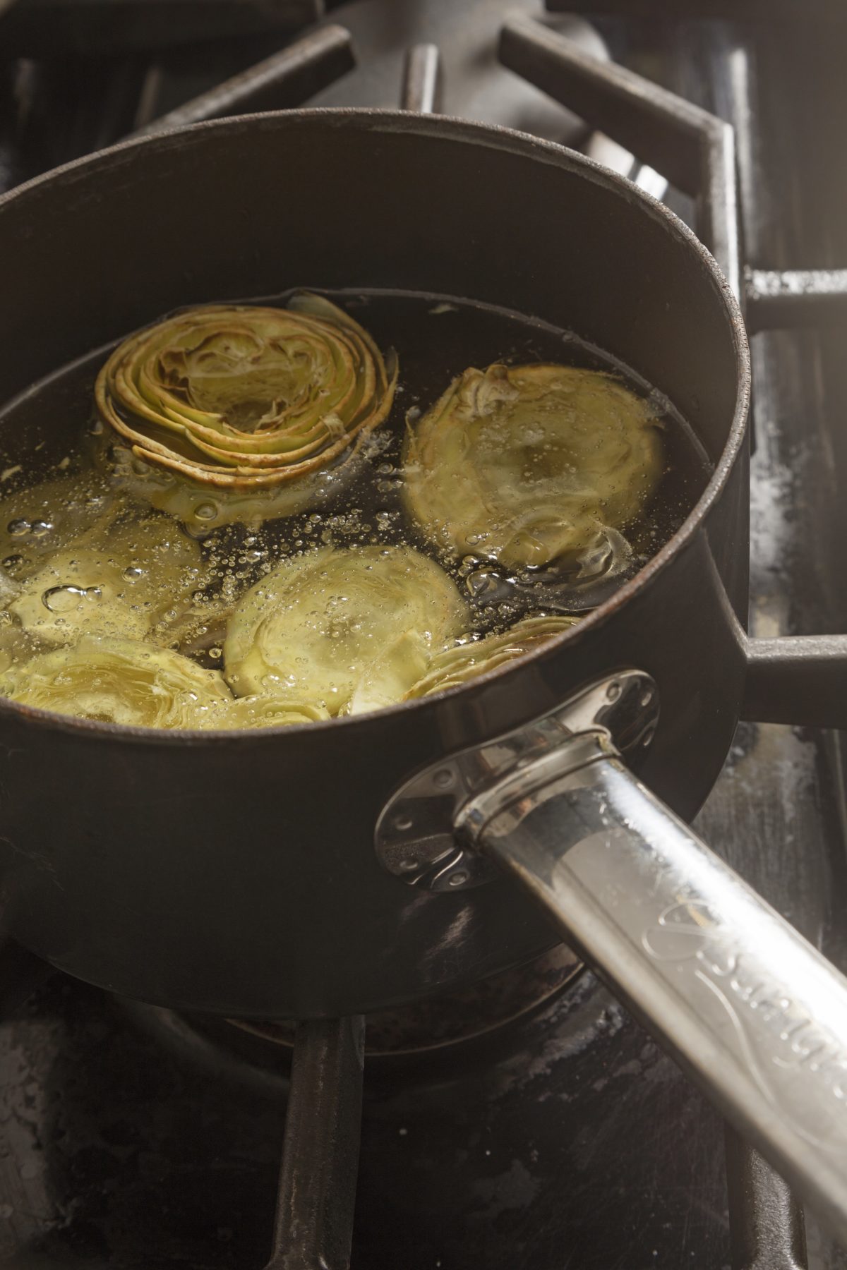 Poached Artichoke Hearts Stuffed with Black Truffle & Mushroom Sauce — Delicious & Sons