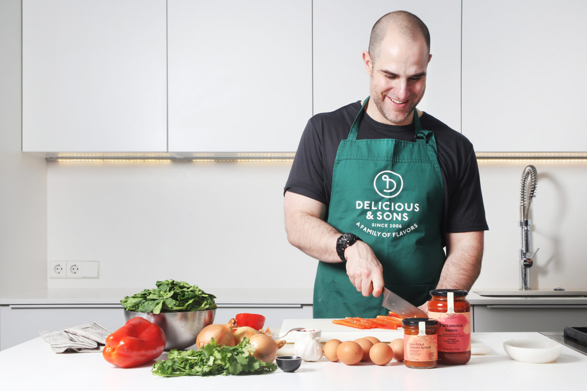 Shakshuka with Spinach and Puttanesca Sauce and Sun-Dried Tomato Spread by Alberto Rey — Delicious & Sons