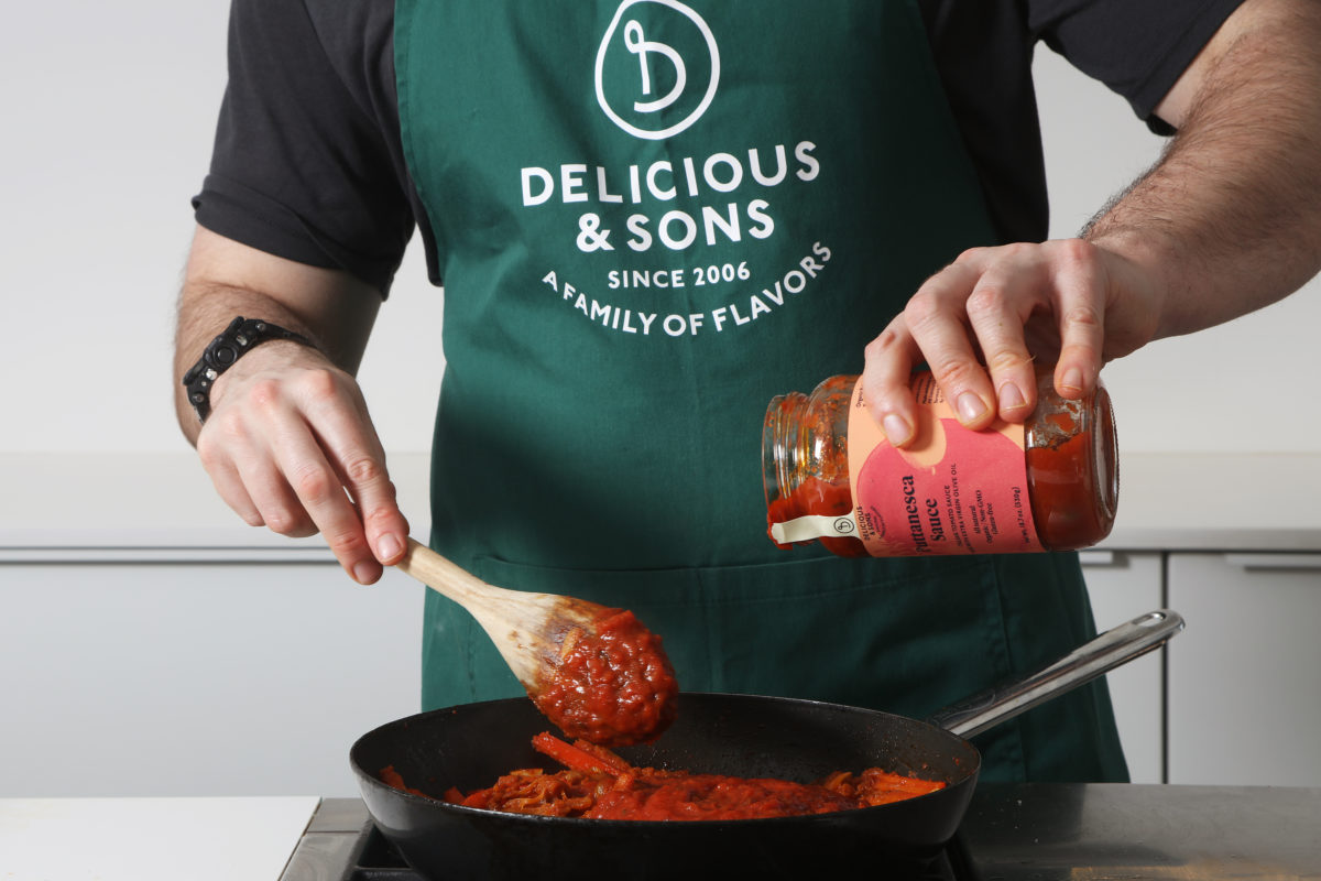 Shakshuka with Spinach and Puttanesca Sauce and Sun-Dried Tomato Spread by Alberto Rey — Delicious & Sons